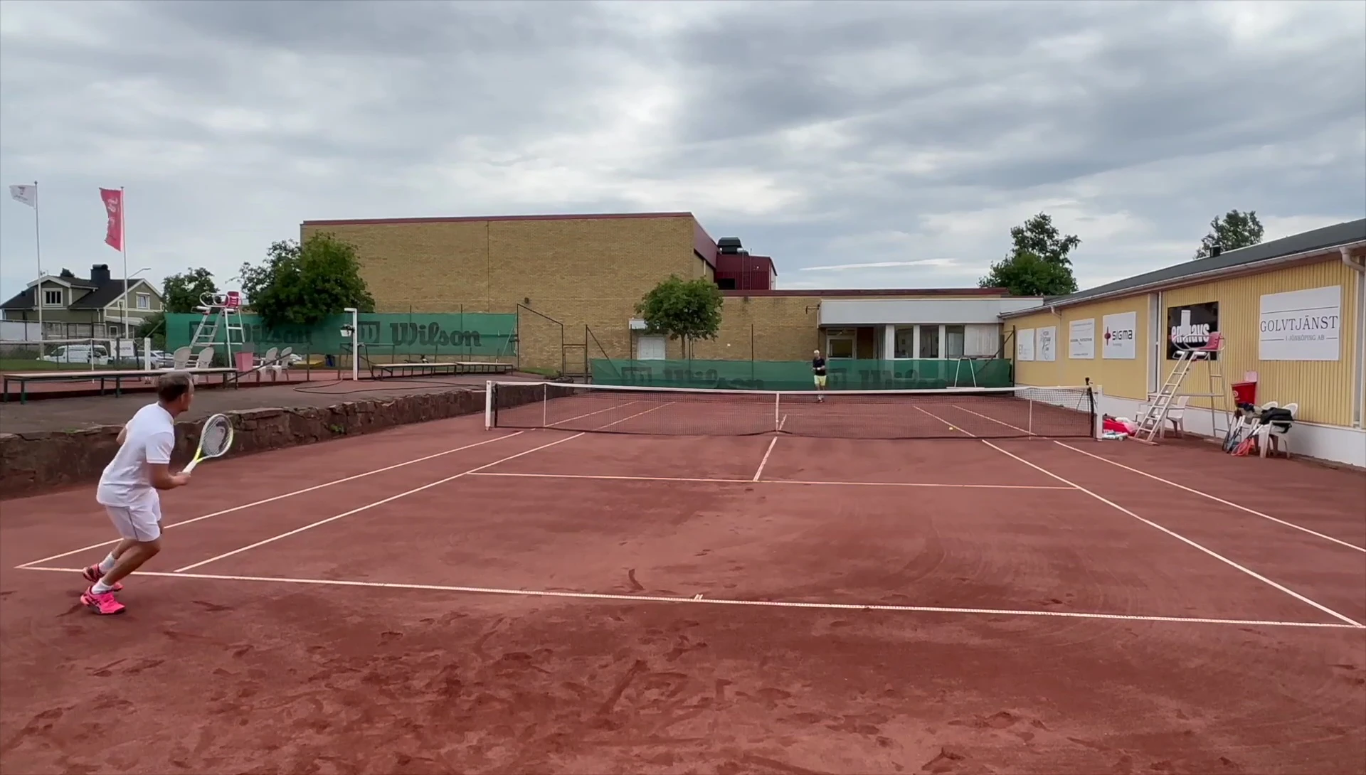 Player hitting a Boston tennis ball