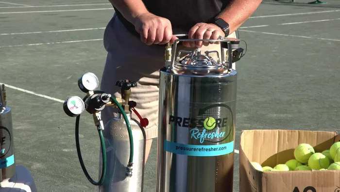 Seal and wait: Once at 40 PSI, close the Schrader valve and wait two to three days (CO2) or two to three weeks (regular air).