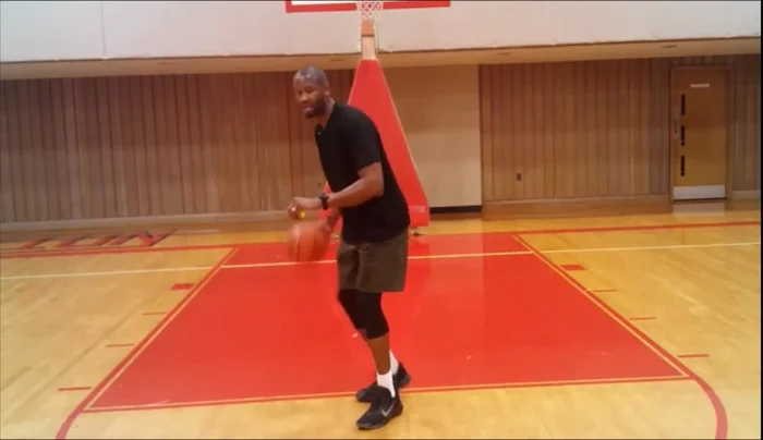 Incorporate movement: Toss the ball ahead, run through it, and snatch it to keep your off-hand engaged and your palm down.