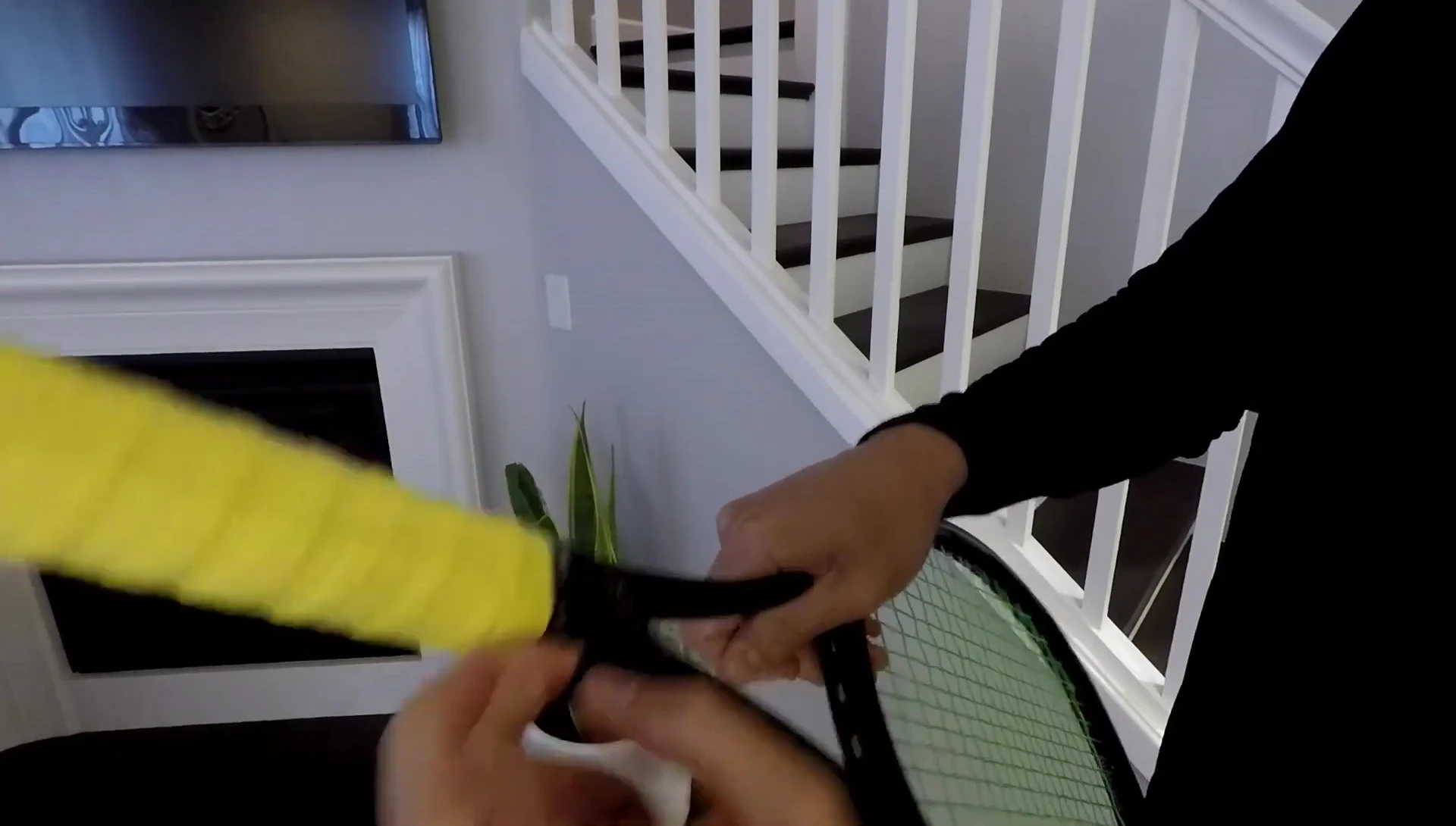 The completed overgrip on the racket