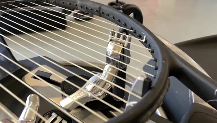 Tie off the final eighth gut main on the nearest seventh main to reduce tension loss. 