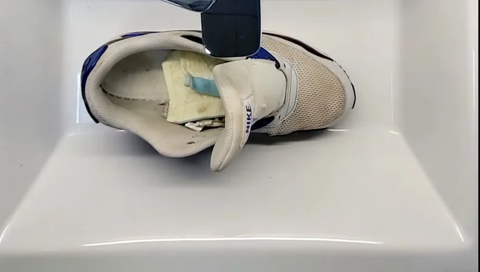 Lightly wet the mesh areas of your sneakers.