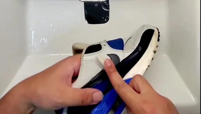 Rinse and repeat the process until satisfied. The sneakers will appear whiter once all the toothpaste is rinsed away.