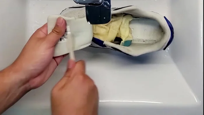 Check and replace the towel inside the shoe as needed until completely dry.