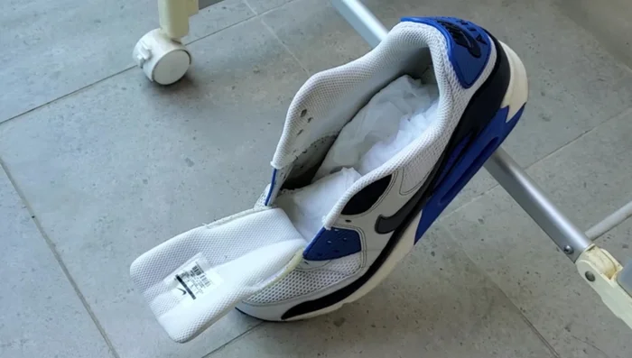 Check and replace the towel inside the shoe as needed until completely dry.