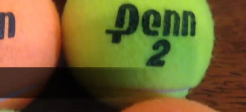Comparison of orange and yellow balls after hitting