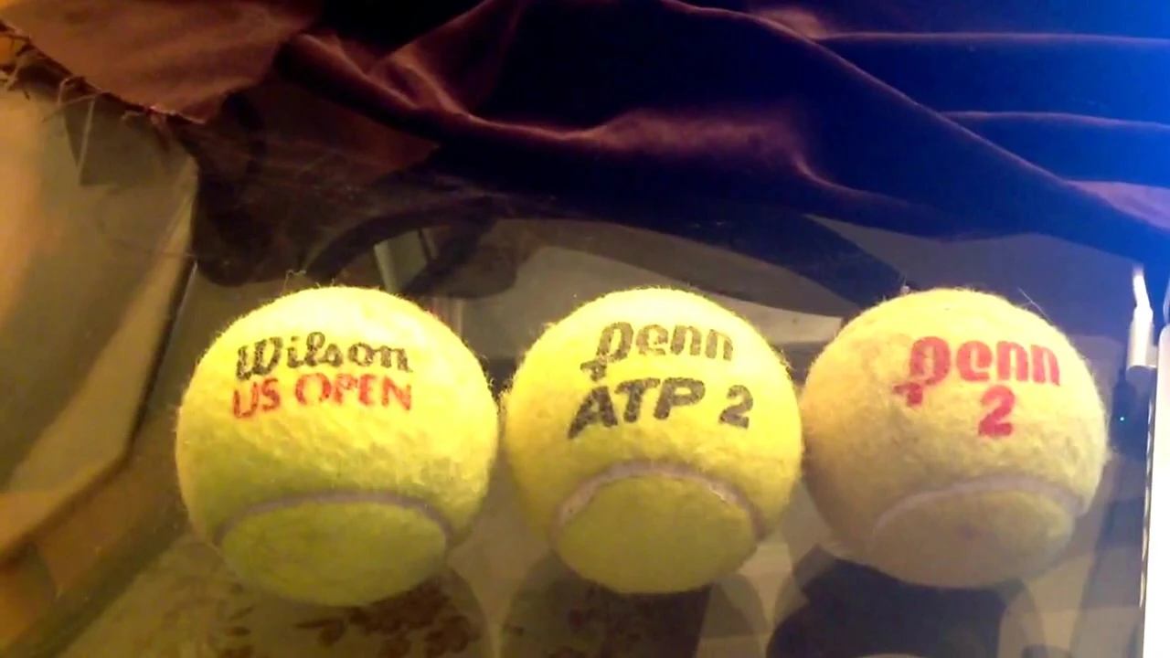 Close-up comparison of the 2013 Wilson US Open ball to other tennis balls