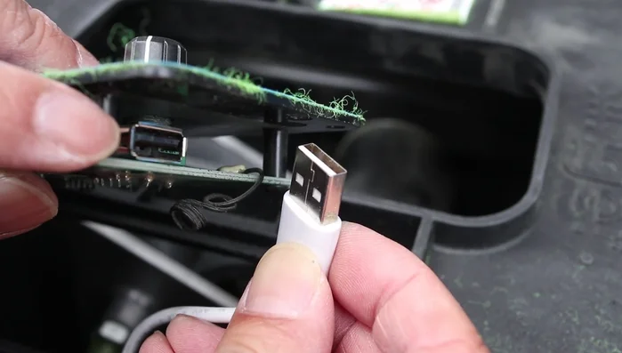 Test the USB plug in the side pocket to ensure functionality.