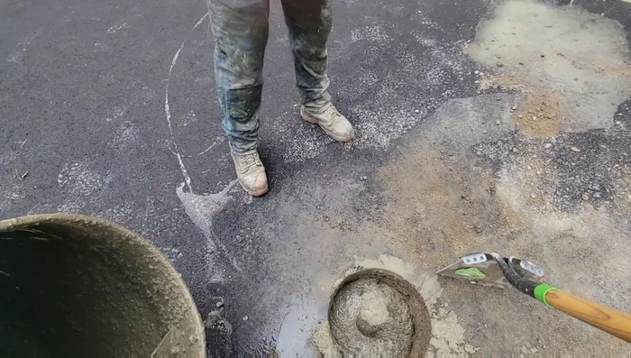 Fill the sleeves three-quarters full with concrete.