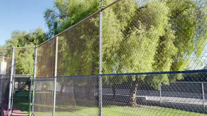 For higher vantage points, use the 10-inch selfie stick to mount the GoPro at the top of the fence.