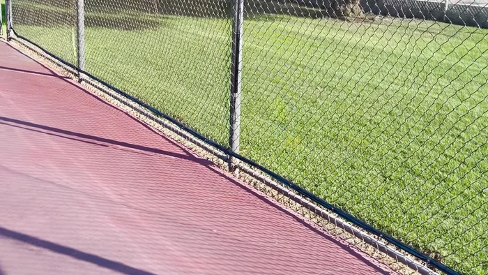 Adjust the camera angle and secure the setup using a velcro strap for stability.