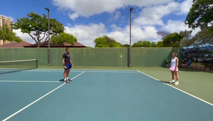 React to the throw, get up quickly, and catch the ball before it bounces twice.