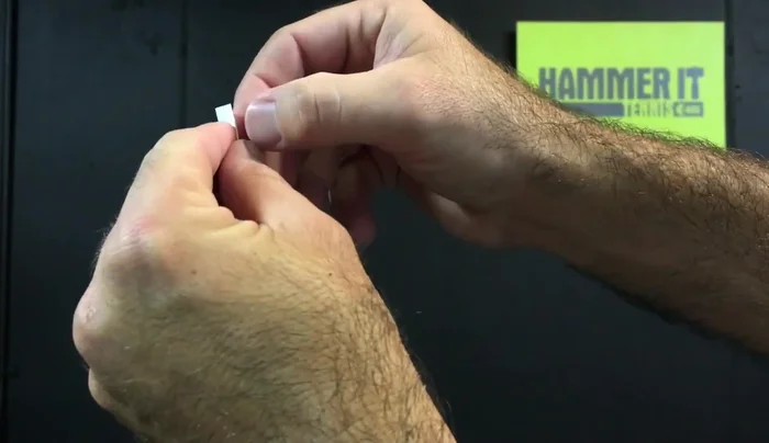 Remove the cellophane from the grip. (Note: This is more time-consuming than with Tournament grips)