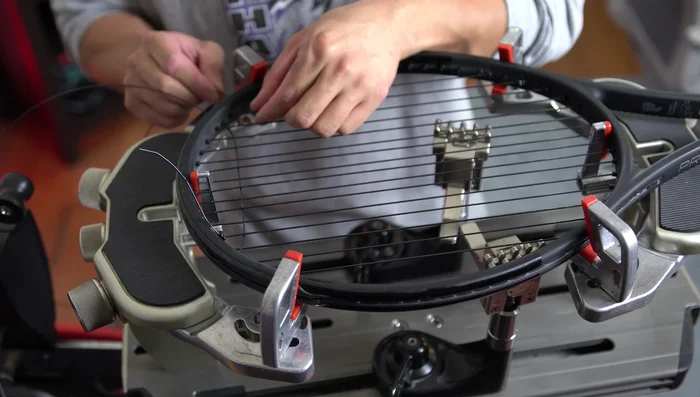 Repeat Steps 2-4: Continue weaving and tensioning crosses across the racket until complete.