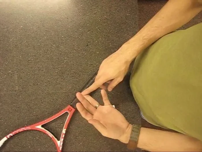 Clean the racket handle: Remove any residue from previous grips.