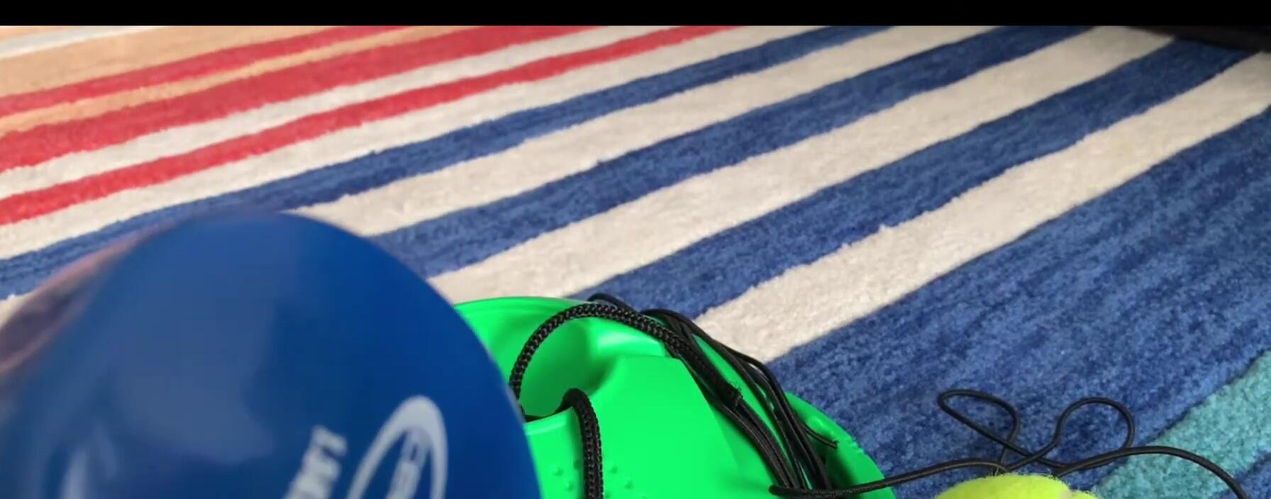 A weight being used to secure the trainer