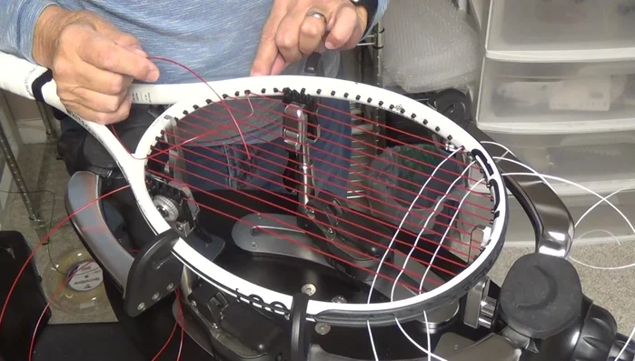 Remove the bulge on the outside of the string channel by pulling tension on the string.