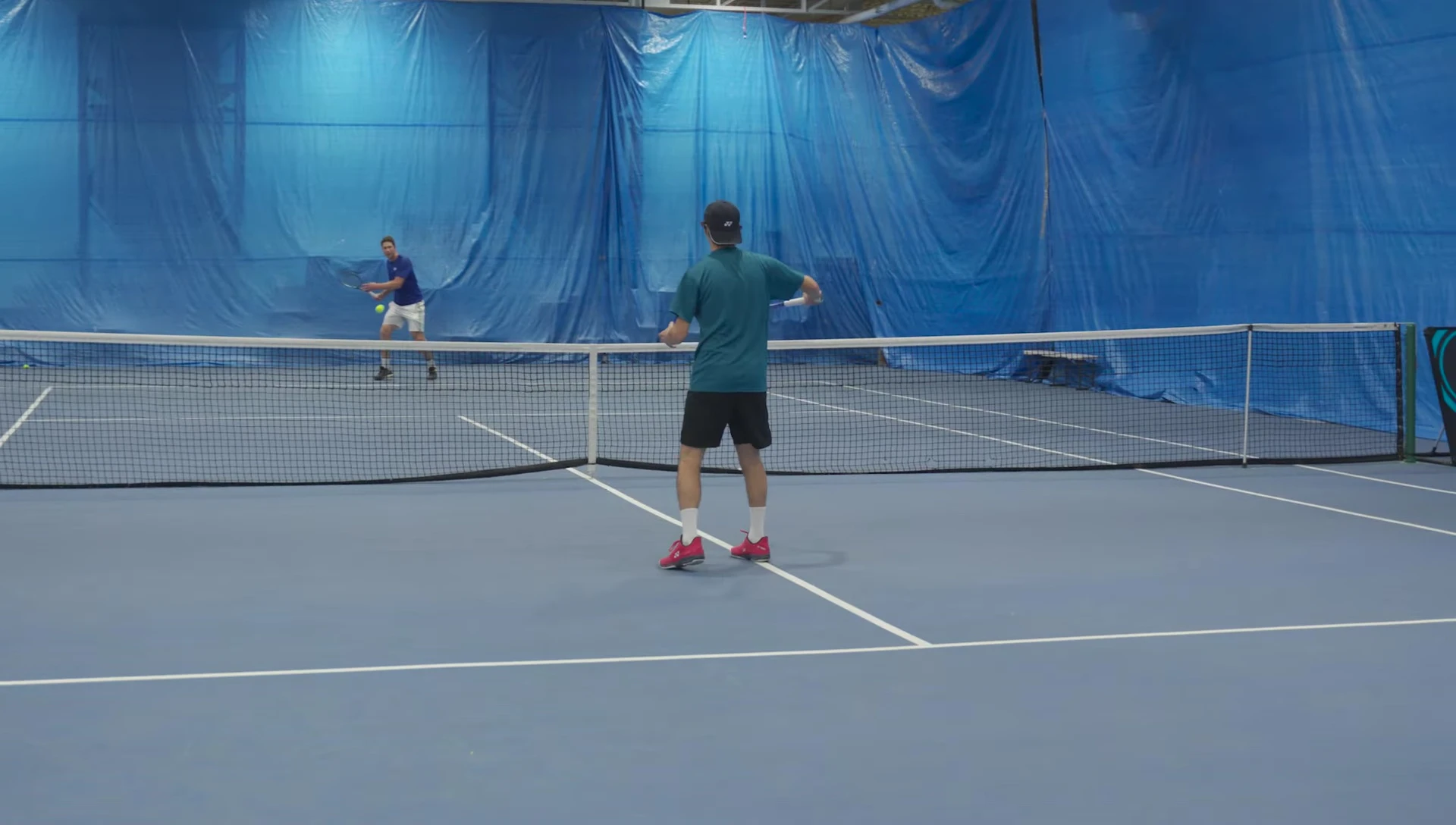 Player executing a volley with the 8th generation racket.