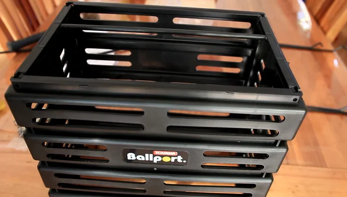 Repeat the process for the remaining side panels and bottom panel, referring to instructions as needed. Ensure panels are correctly aligned before securing.