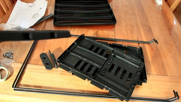 Assemble the side panel, using the hammer to gently tap it into place.