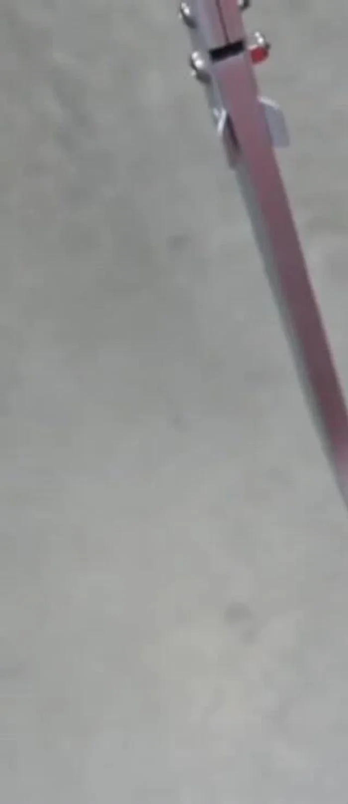 Remove the plastic feed wheel from the ball machine.