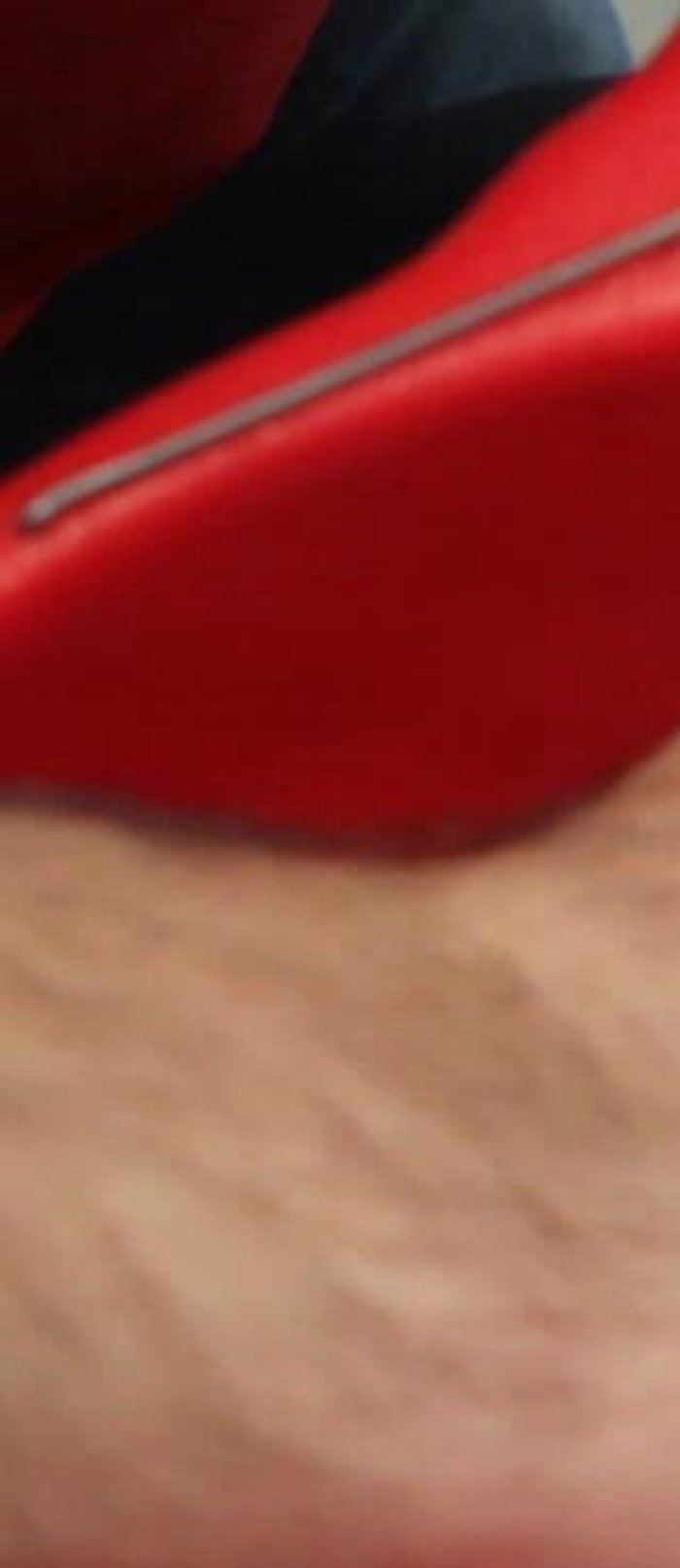 Push the tennis balls back up the chute and remove them from the top.