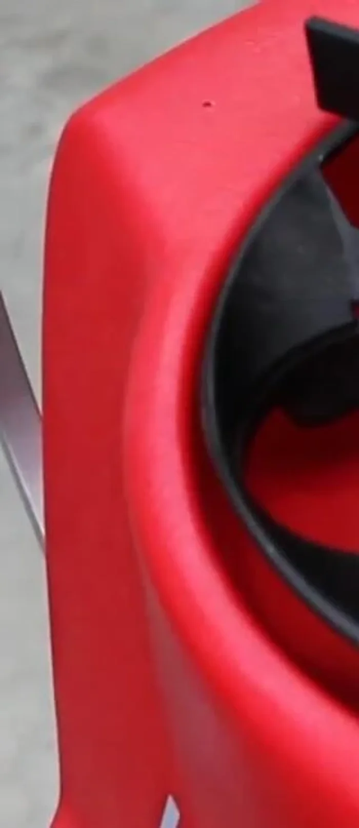 Reattach the wire deflectors back onto the ball machine.