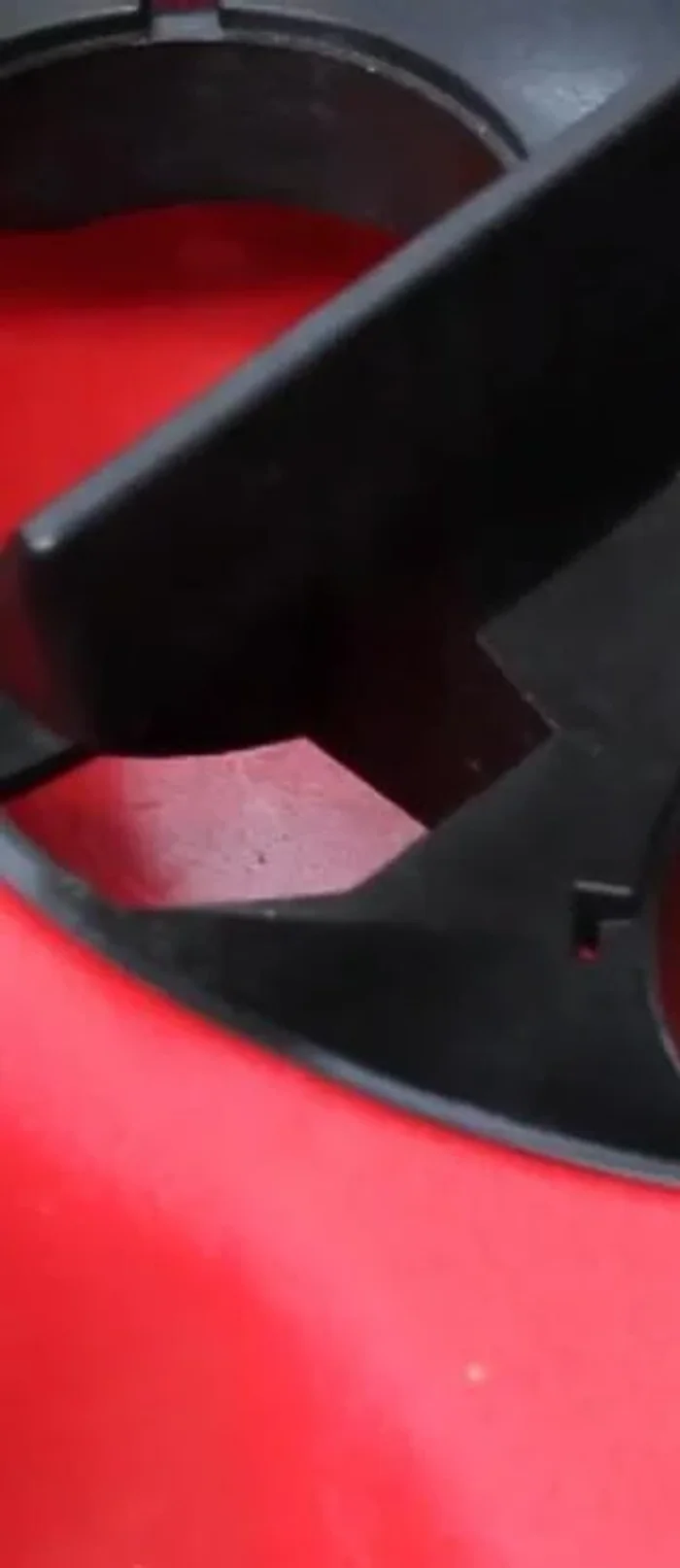 Reattach the wire deflectors back onto the ball machine.