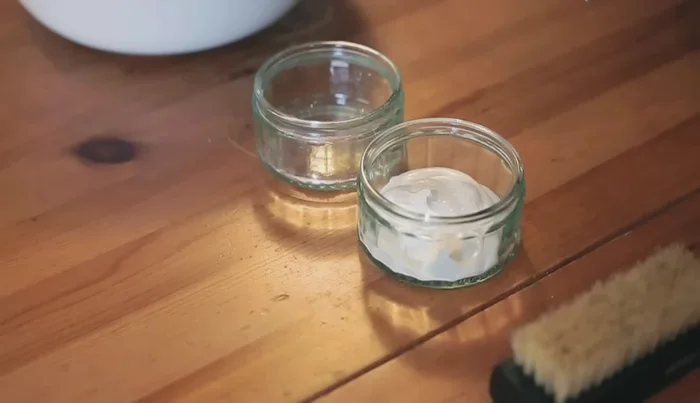 Remove toothpaste foam with a clean damp cloth and let dry.