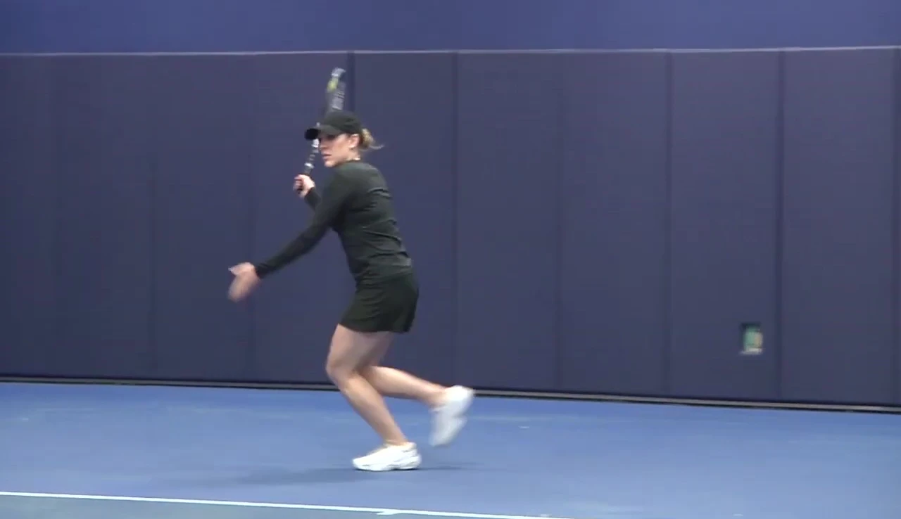 The reviewer holding the Gamma Razer 98M racquet.