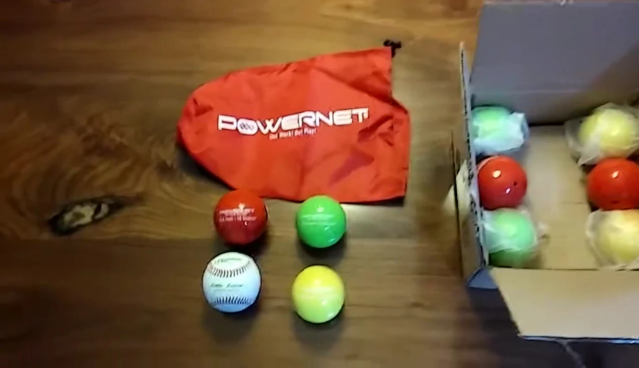 The coach talking about the benefit of the weighted balls for pitchers.