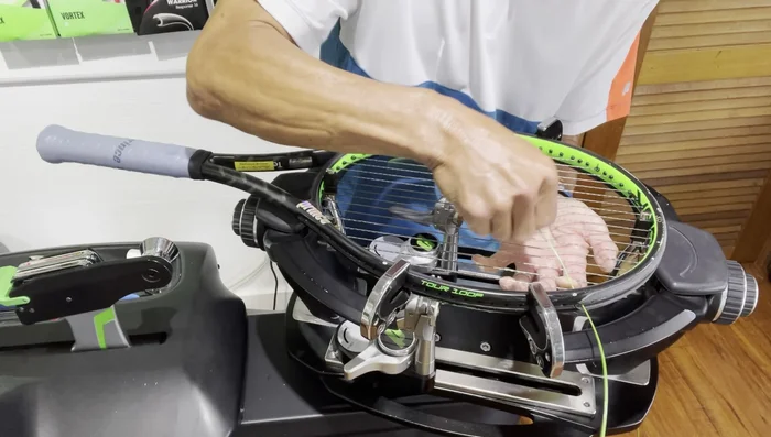 Starting from the intersecting cross string (e.g., third cross), weave the first three crosses.