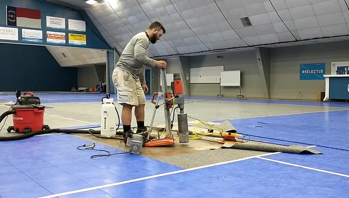 Connect vacuum pump: Attach the vacuum pump to create suction, preventing the drill from moving during operation.