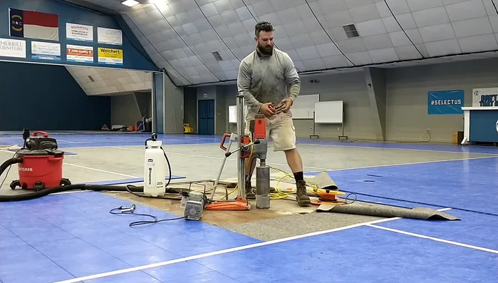 Connect vacuum pump: Attach the vacuum pump to create suction, preventing the drill from moving during operation.