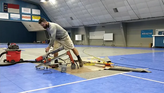 Connect vacuum pump: Attach the vacuum pump to create suction, preventing the drill from moving during operation.