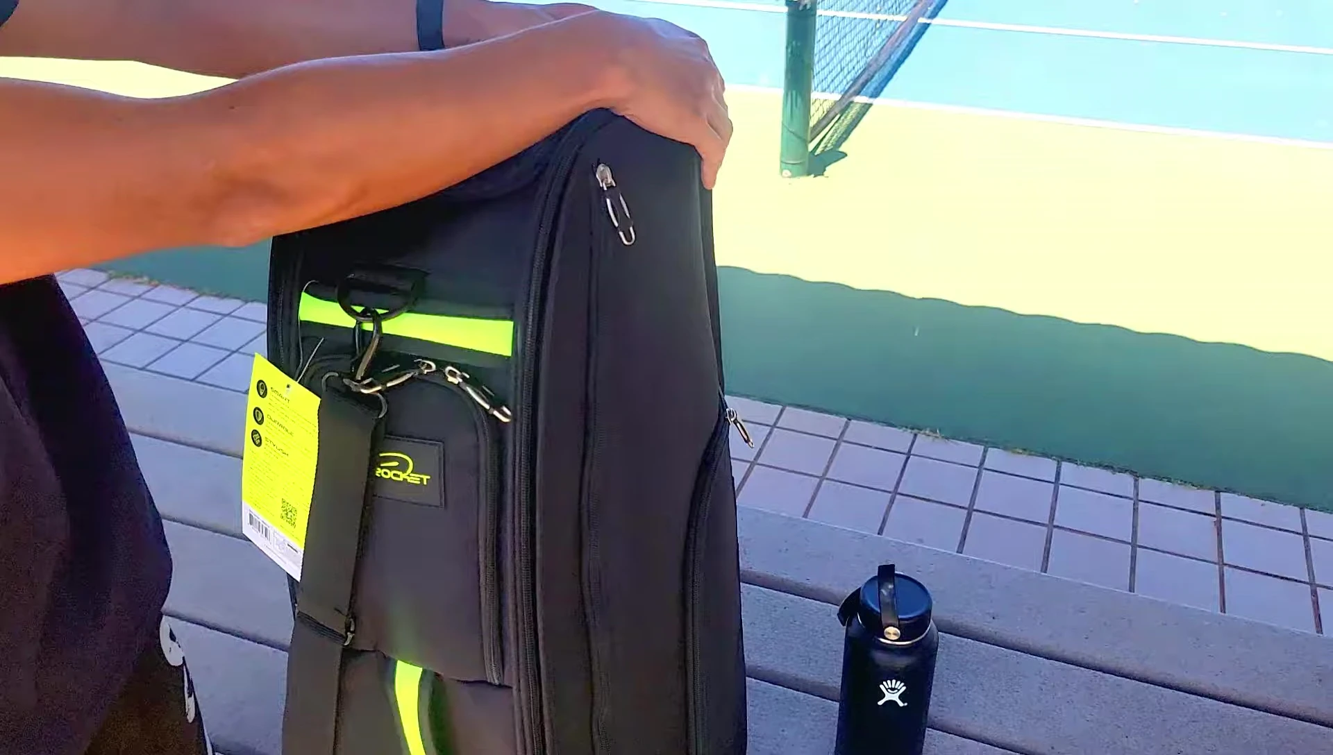 Close-up of the color-coded zippers on the bag.