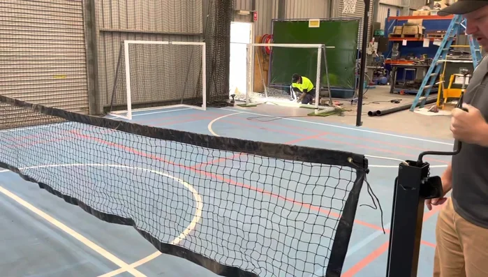 Remove the handle once the desired height is reached. Replace the little lid on top of the winder mechanism.