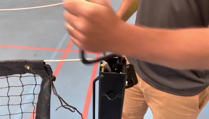 Remove the handle once the desired height is reached. Replace the little lid on top of the winder mechanism.