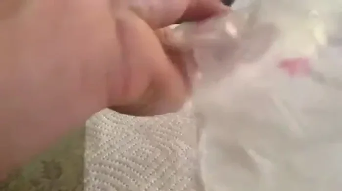 Press the inflated bag firmly against the car door to apply pressure to the lock mechanism.