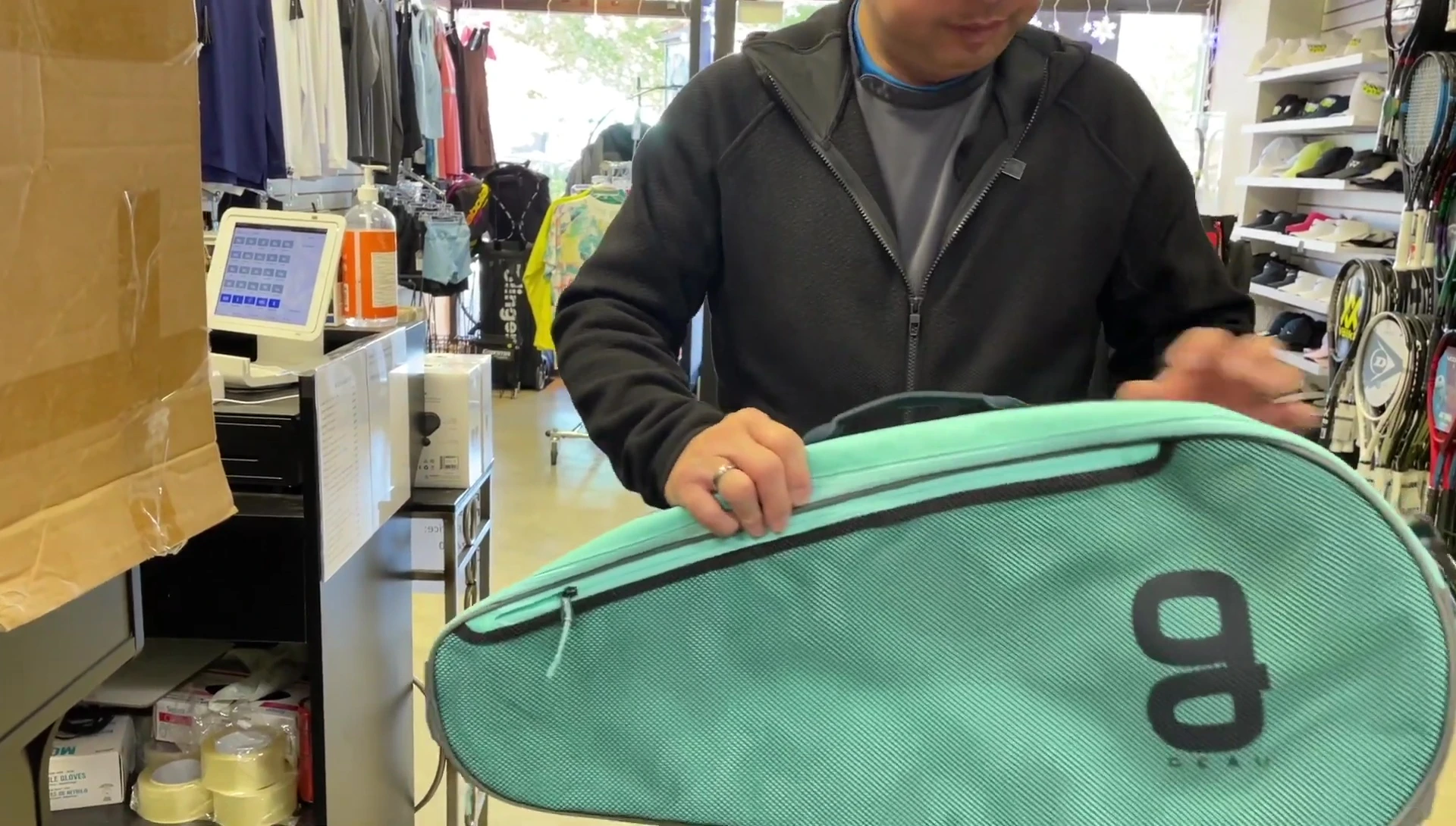 Interior view of the three-pack bag showing the main compartment and additional pockets.