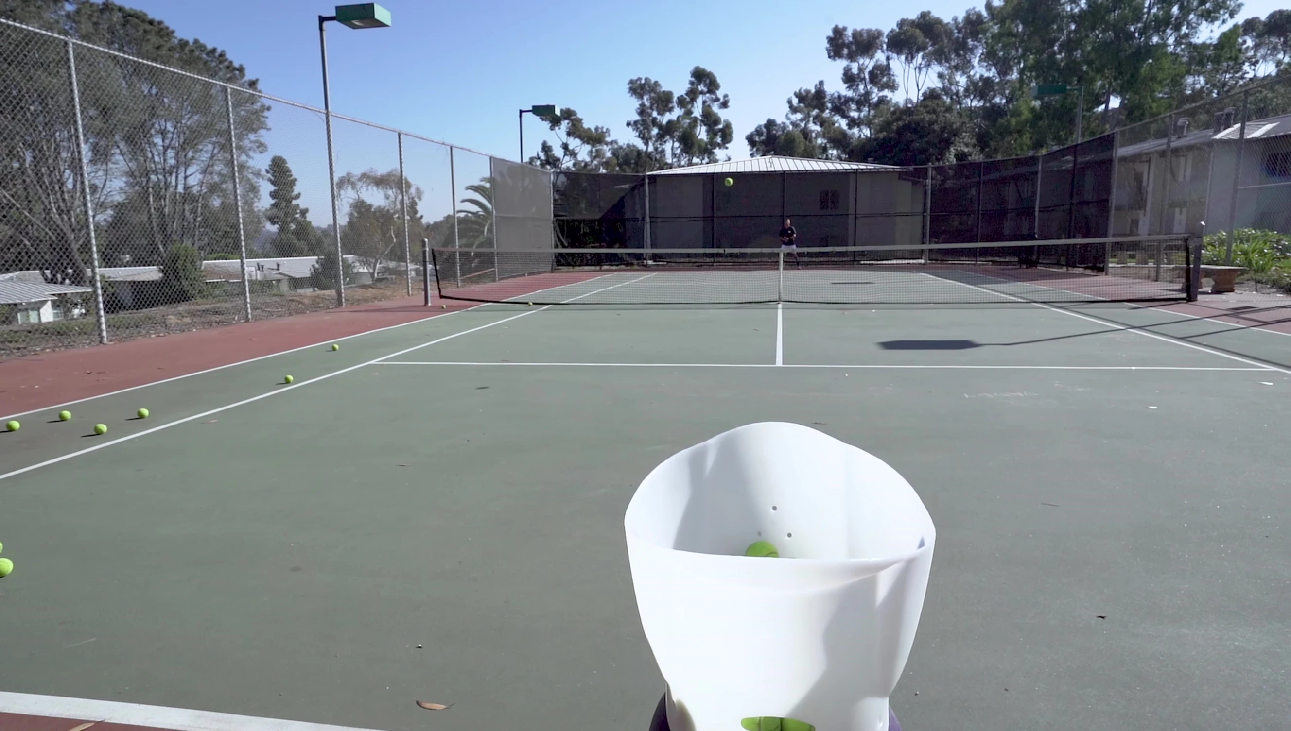 Slow-motion footage of ball impact with multifilament strings