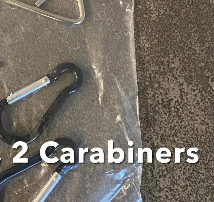 Add the metal hooks to the velcro straps on the ball chute.