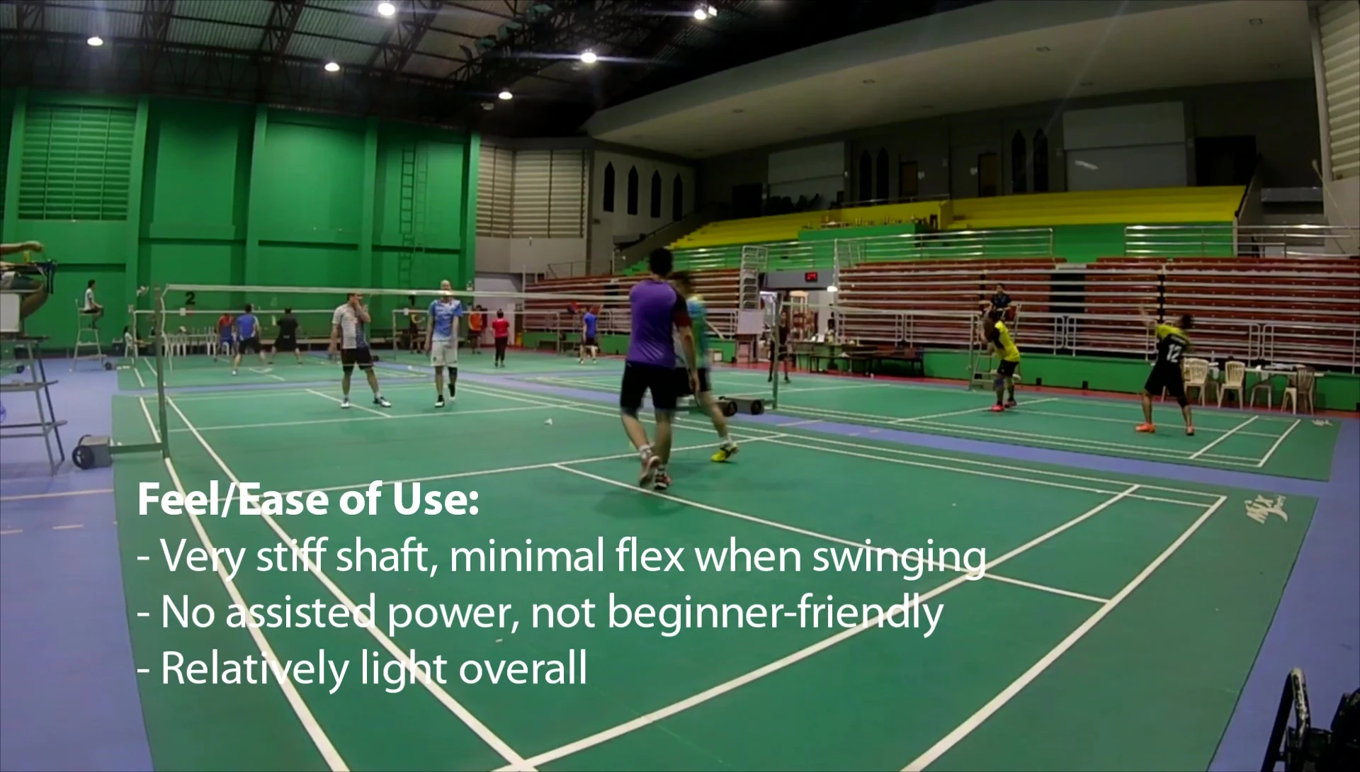 The reviewer discussing the racquet's power generation challenges for beginners.