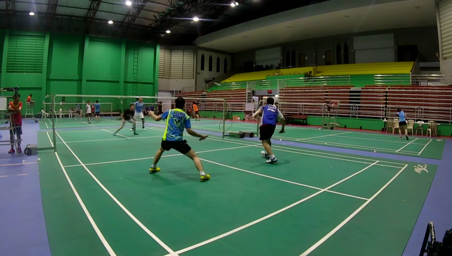 The reviewer showcasing clears and smashes with the racquet.