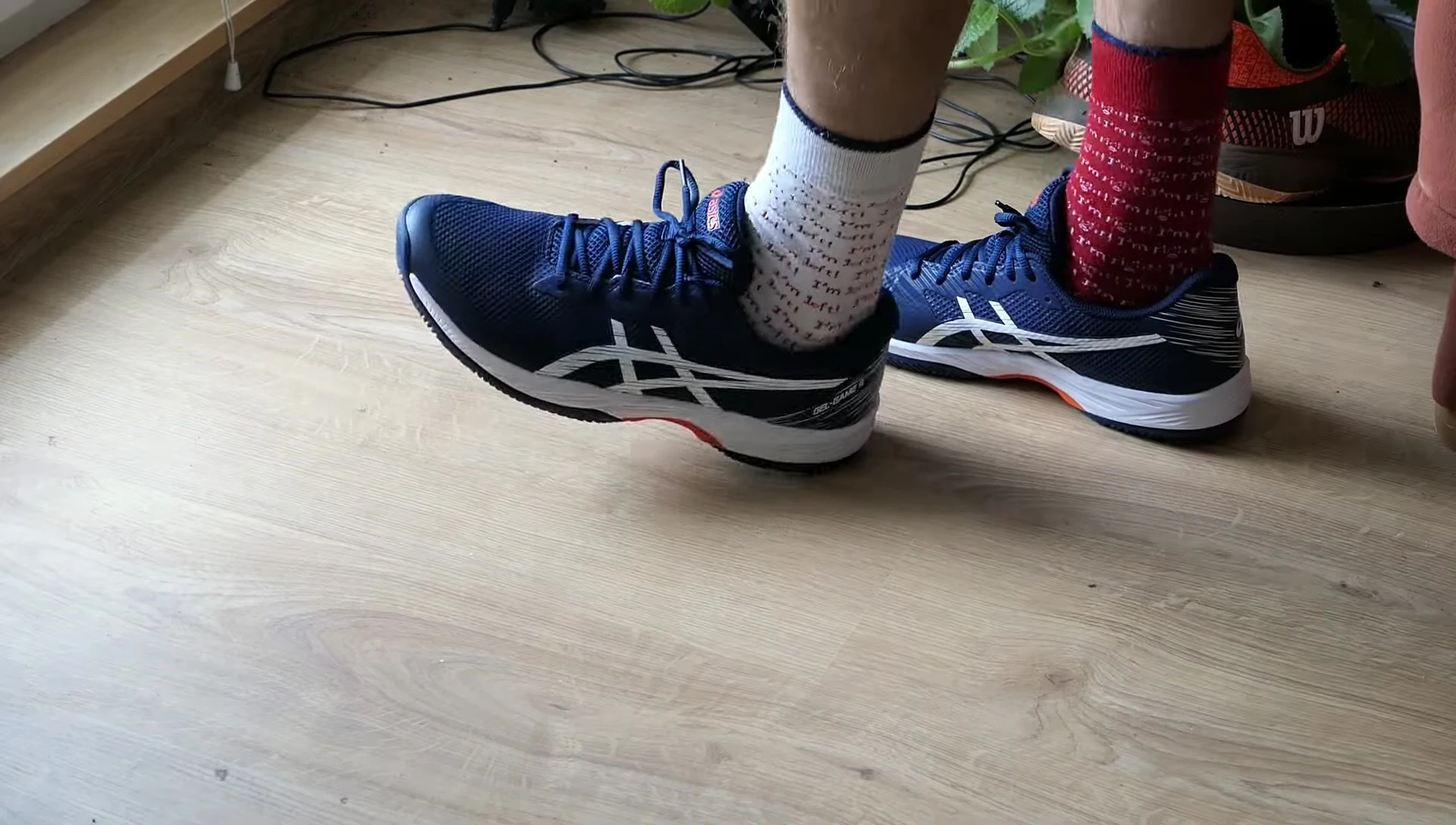 Image or mention of the reviewer's teammate wearing the GEL-GAME 9.