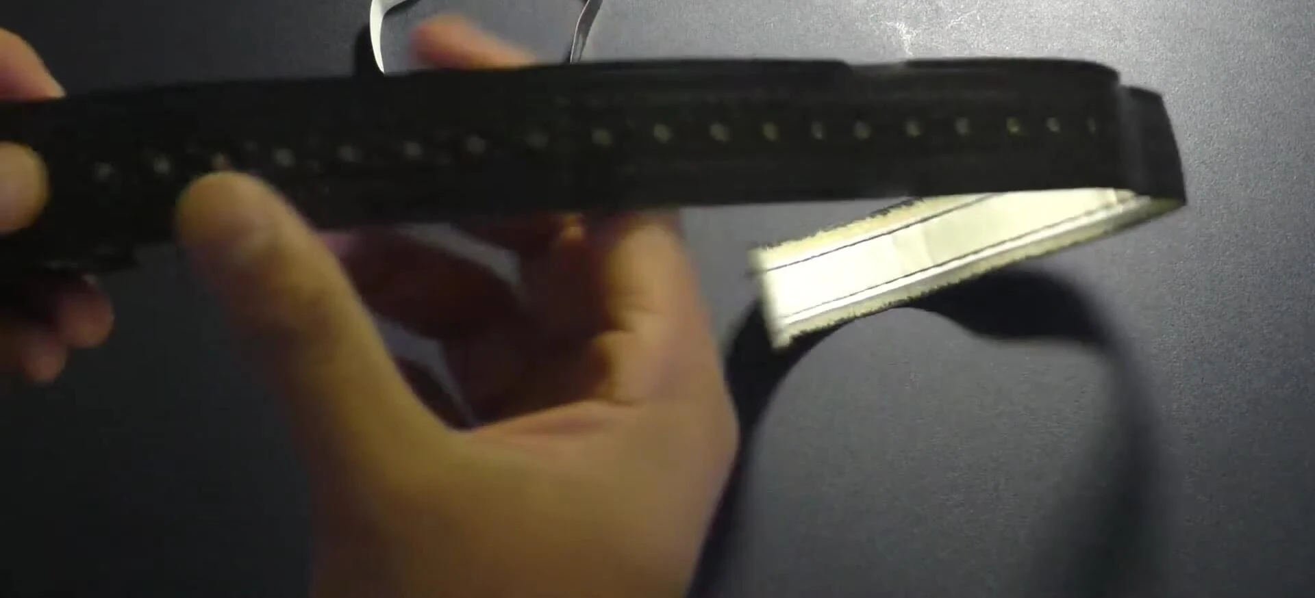 Close-up shot highlighting the grooves and thinner edges of the grip.