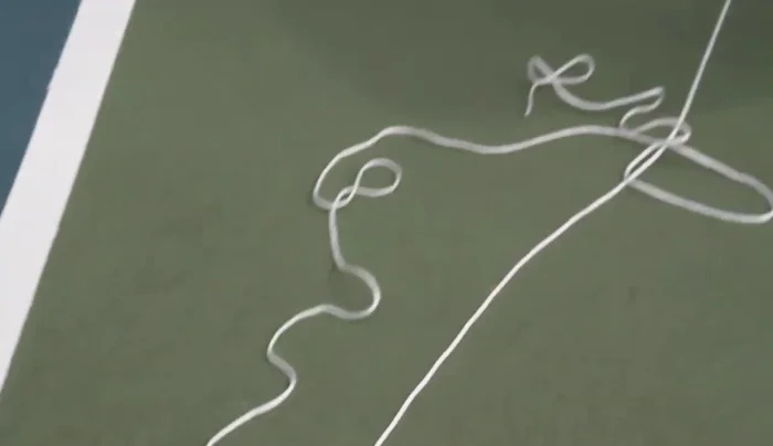 Secure the ends of the string.