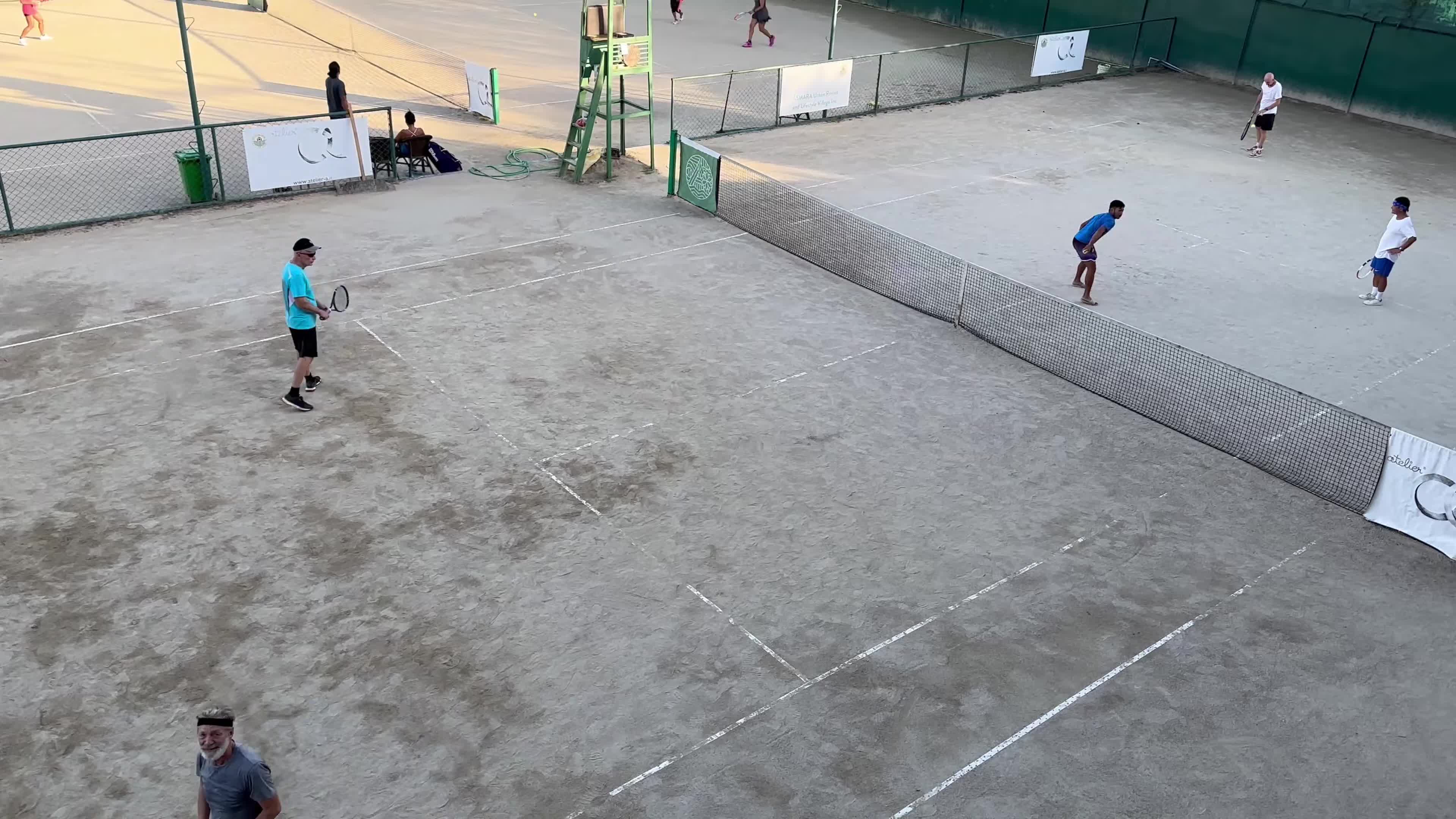 A shot of a tan-colored tennis court in the Philippines.