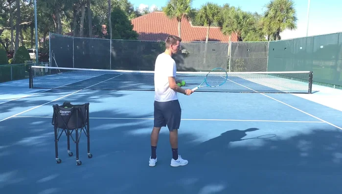 Let your wrist lag naturally behind the racket head, similar to a regular forehand.