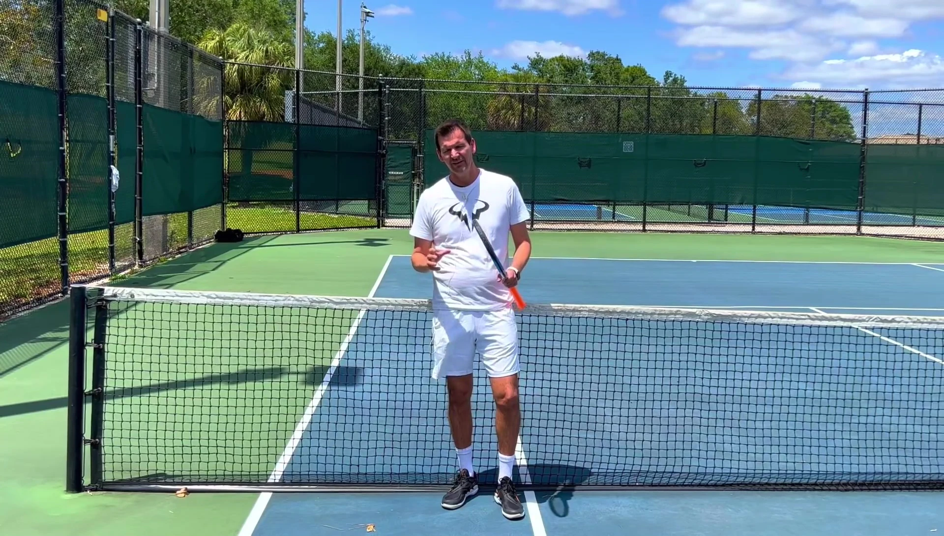 People easily engaging in a pickleball match
